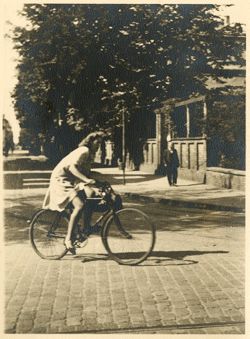 Young woman riding bike in Darmstadt, Germany
