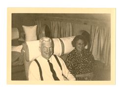 Man and woman sitting in an airplane