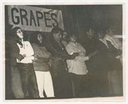 Cesar Chavez linking hands with fellow protesters