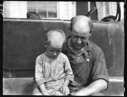 Dad and boy, haircut alike, Dixie Garage, Martinsville