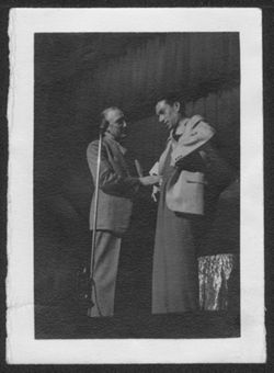 Hoagy Carmichael on stage with an unidentified man.