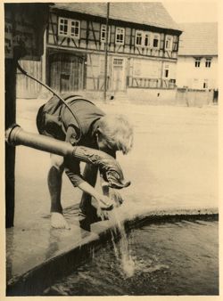Boy at Mulberg's water supply