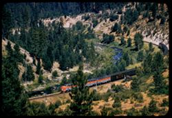 Eastbound passenger train in Feather river canyon near Feather River Inn of WPRR