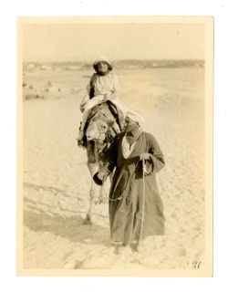 Margaret Howard riding a camel
