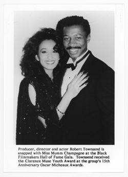 Robert Townsend with Miss Mumm Champagne
