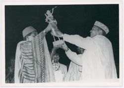 Cheik Oumar Sissoko receiving the Etalon de Yennenga at FESPACO